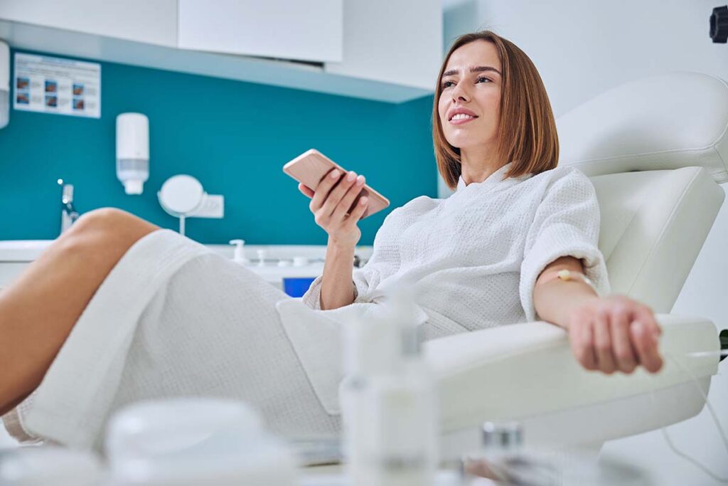 Woman getting IV therapy